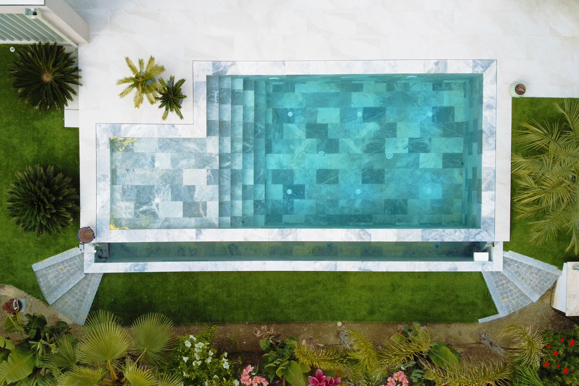 Contemporary luxury villa with garden and swimming pool.