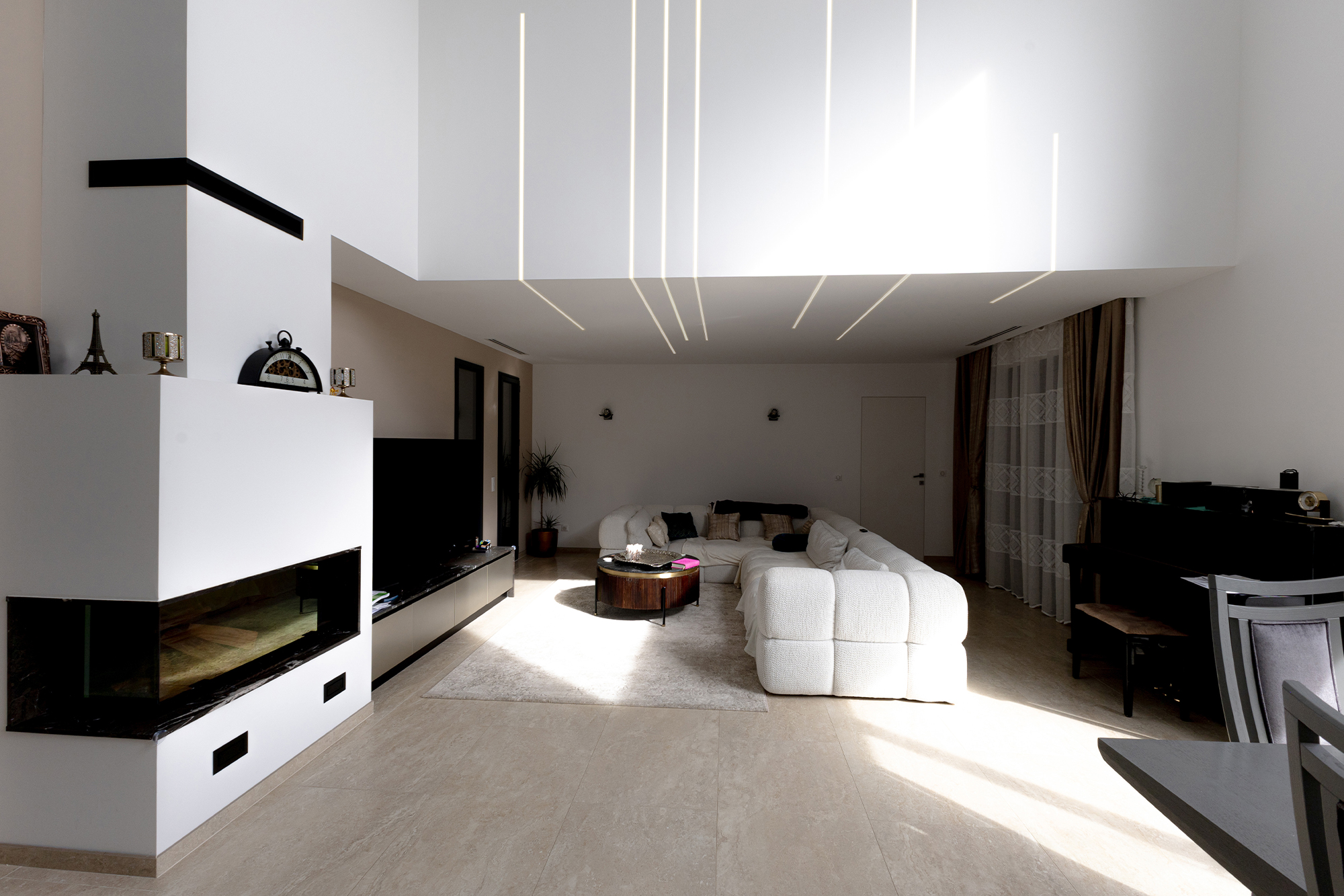 Modern villa living room with high ceilings and open-plan design
