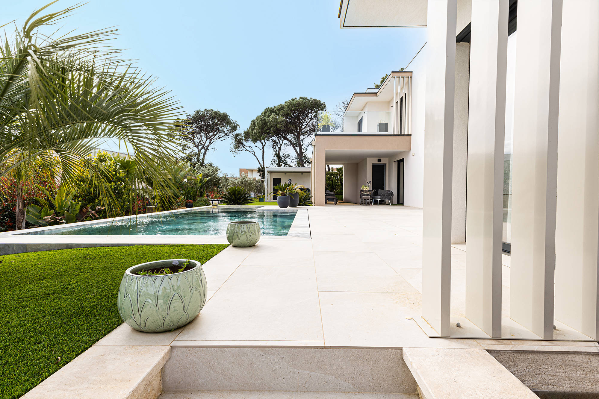 Contemporary property with outdoor living space and pool