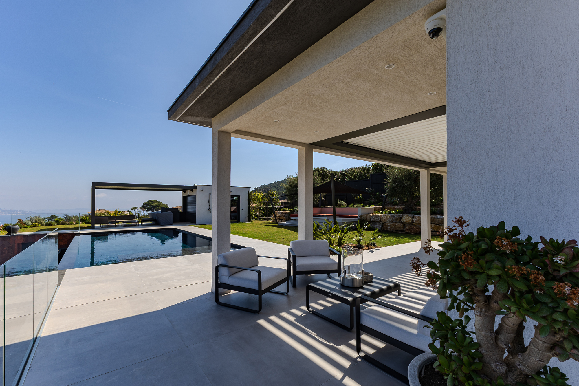 High-end residential villa with pool and open-air living spaces