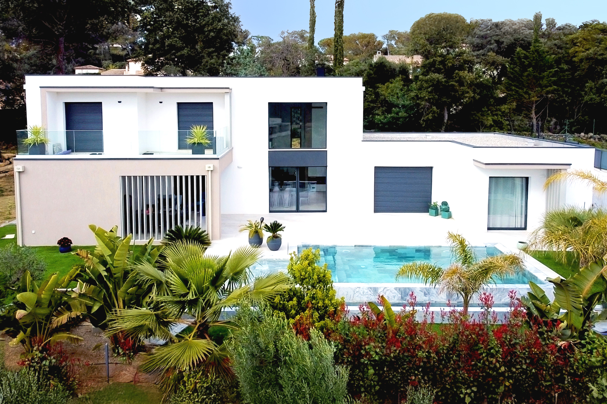 High-end villa exterior with pool and terrace in Saint-Tropez area