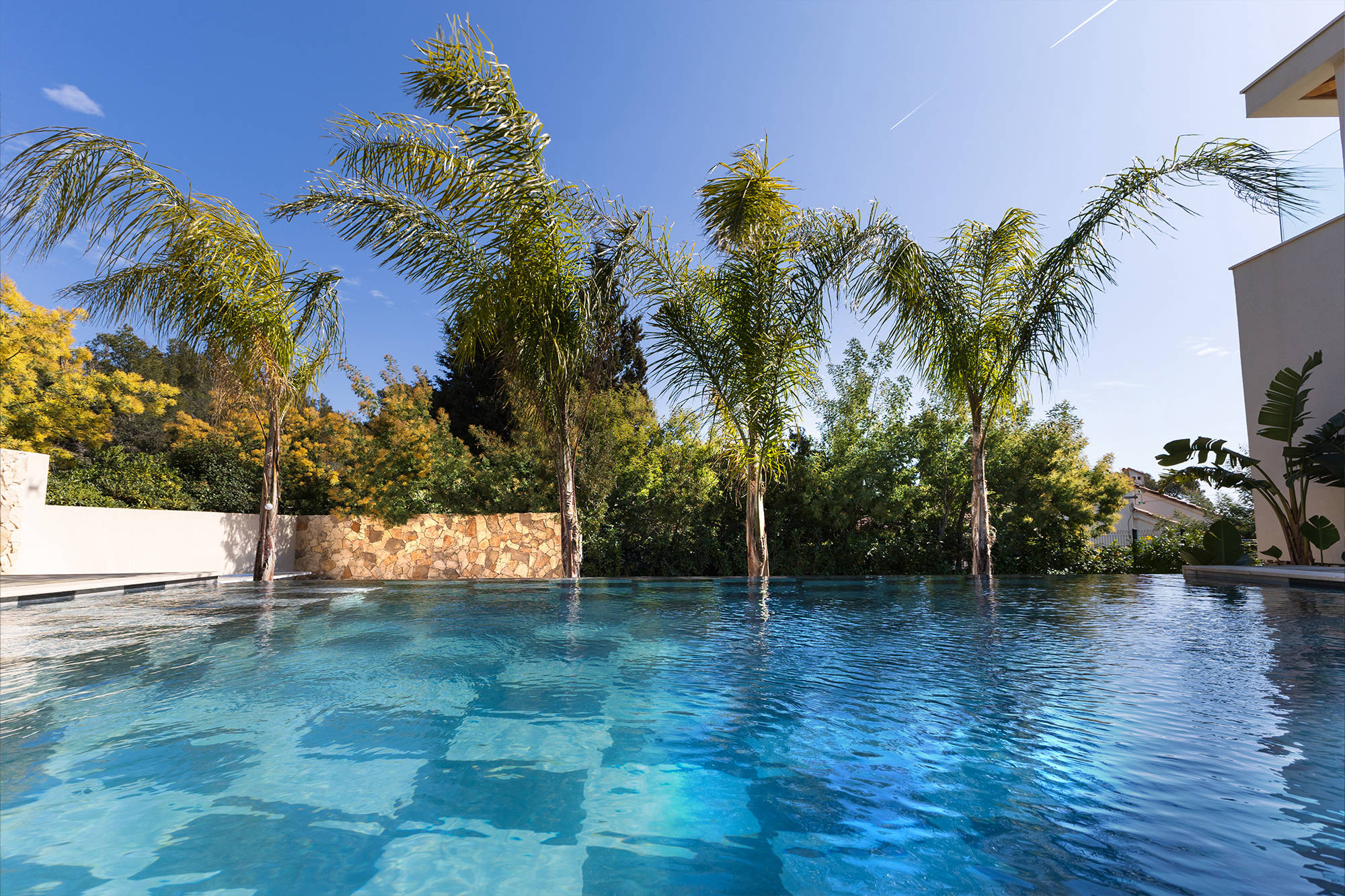 Traditional house upgraded with modern pool design.