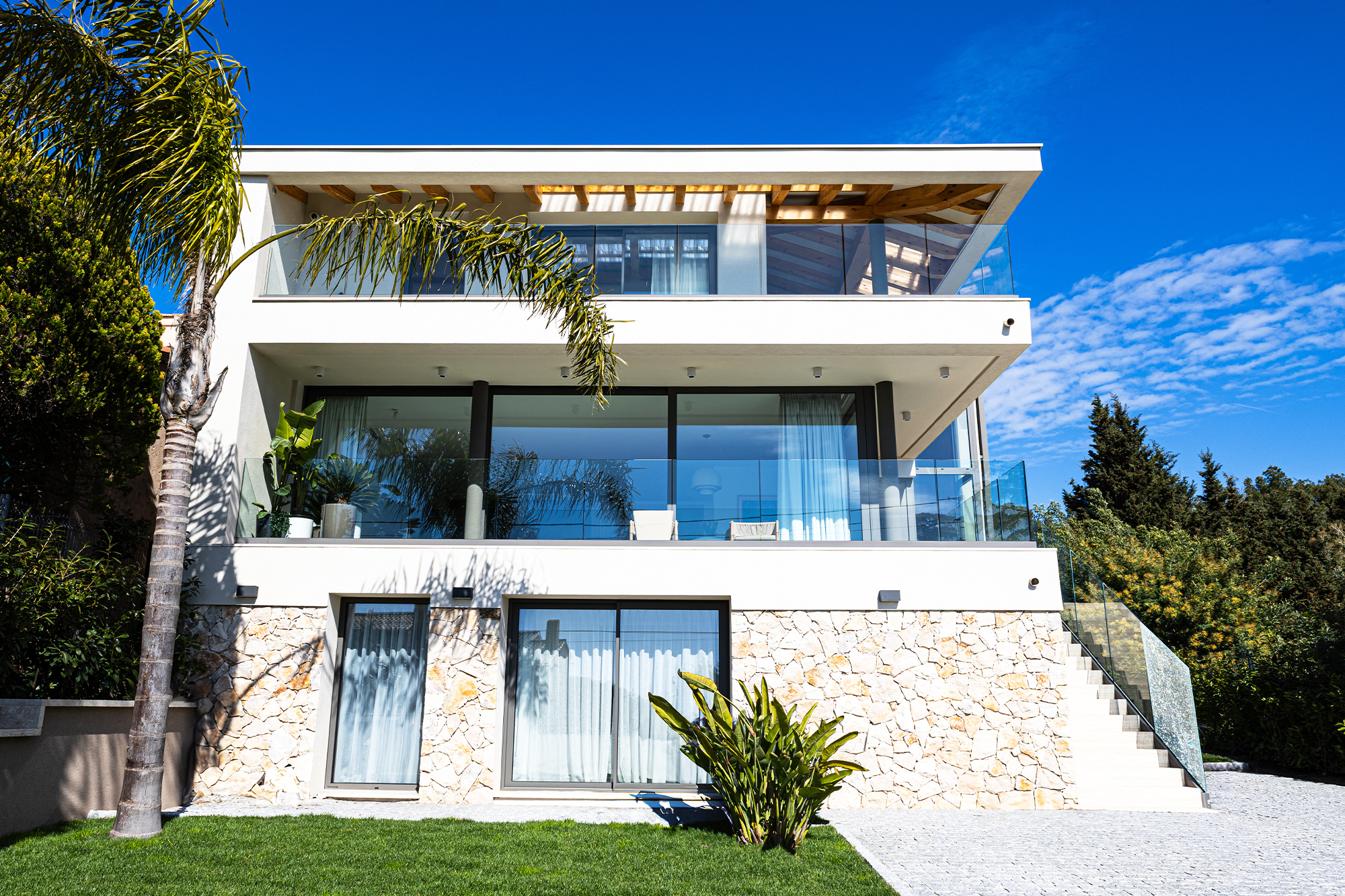 Traditional villa renovation with modern pool and terrace.