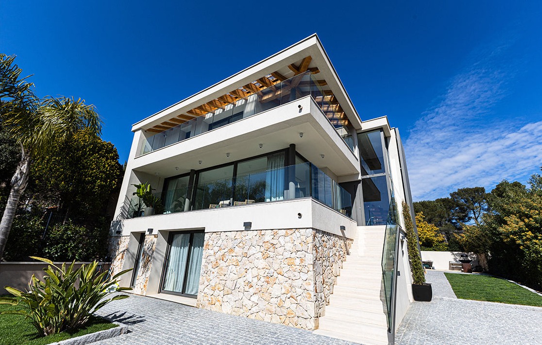 Seamless property renovation of a traditional home integrating out door spaces