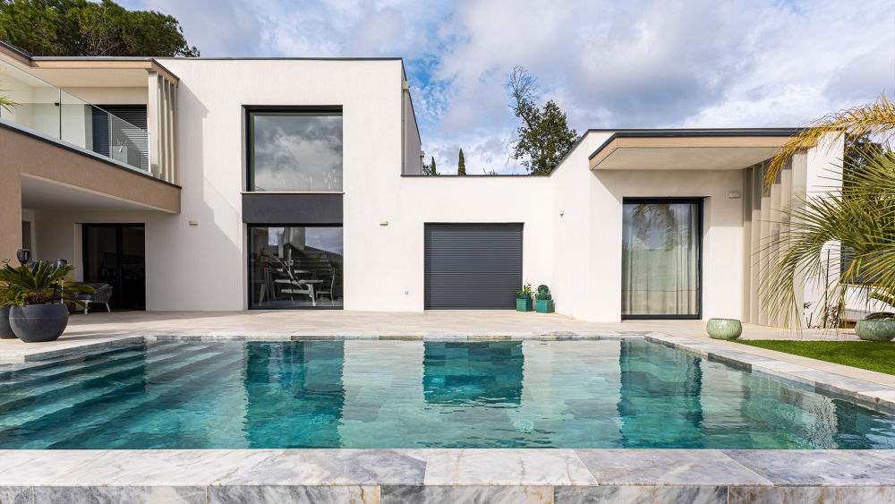 Custom-built luxury estate seamlessly blending into the French Riviera landscape.
